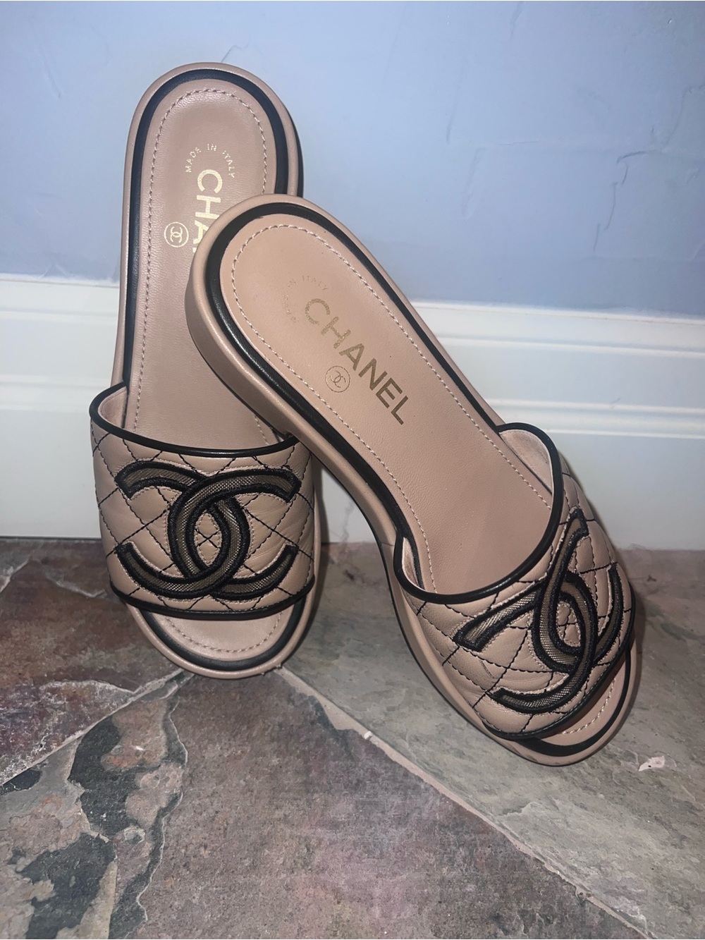 CHANEL Nude Quilted Slide Mules with Black CC Embroidery